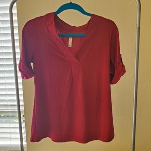 Red blouse gold button detail